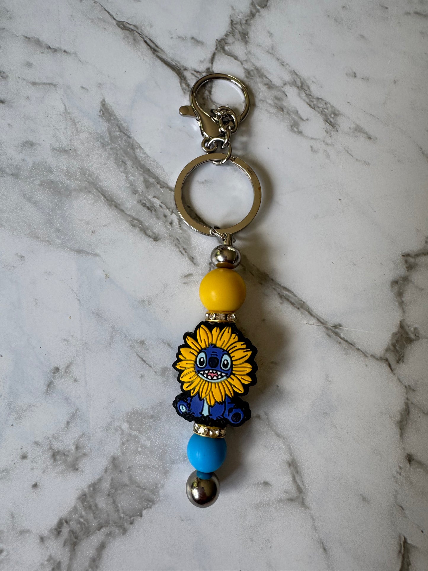 Blue Guy Flower Keyring
